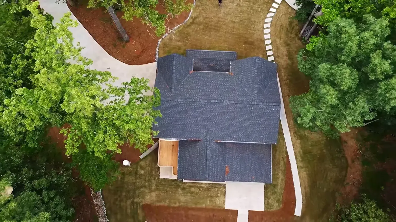 An aerial view of a renovated lake house on Lake Lanier