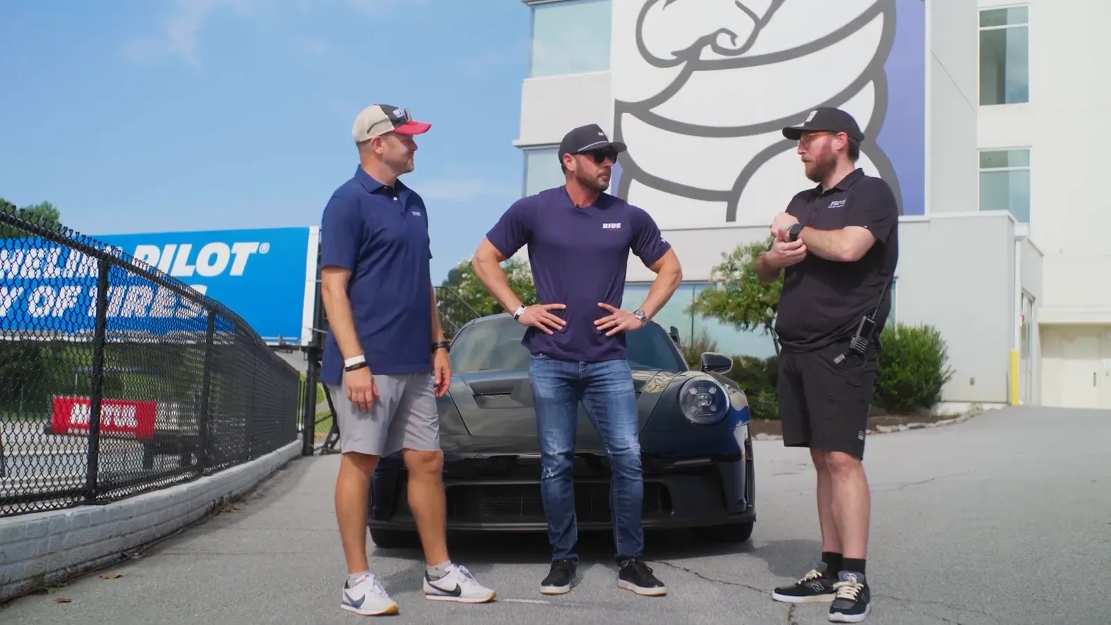 Dave Codrea, Grant Brewer and Adam Sekulow in the paddock at Road Atlanta