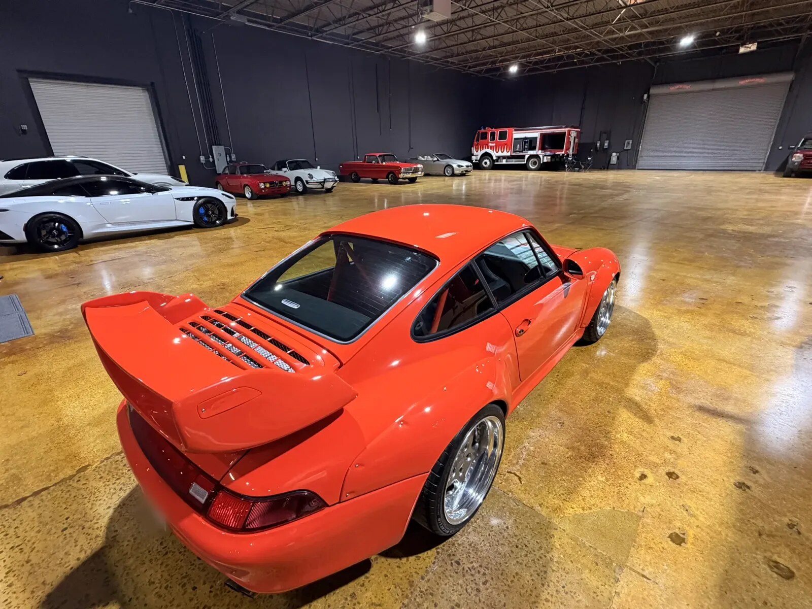 A red Porsche 993 on the Atlanta storage floor