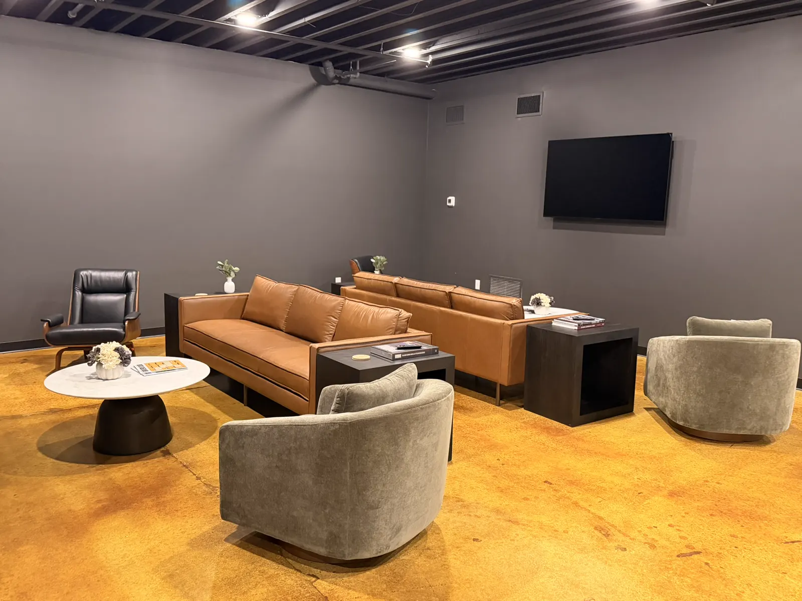 Leather sofas and armchairs in the Atlanta members' lounge