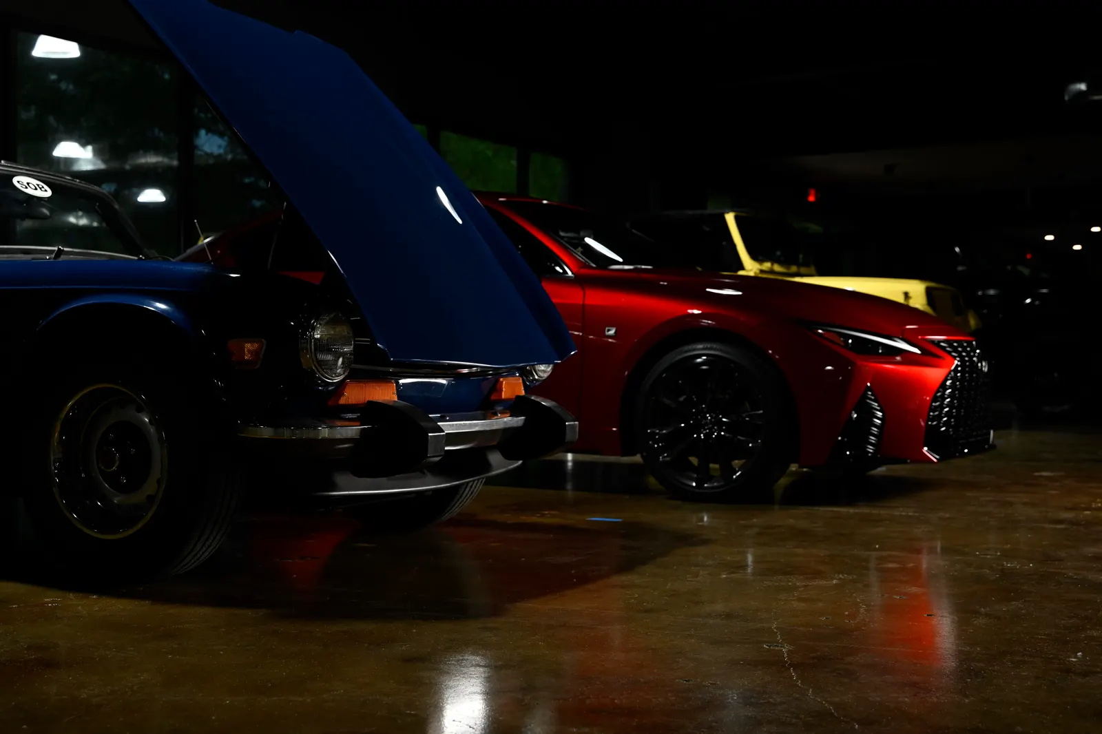 Cars on the floor under evening lighting